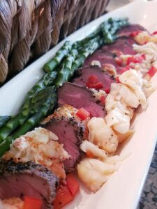 Beef tenderloin with live Maine lobster wedding catering