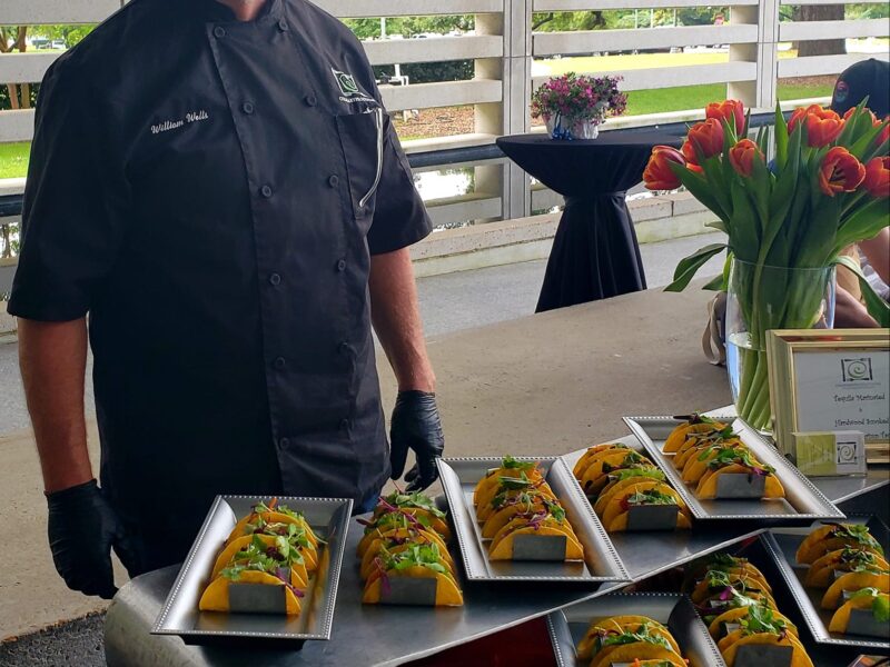 Chef Wells and catering display of smoked shrimp tacos