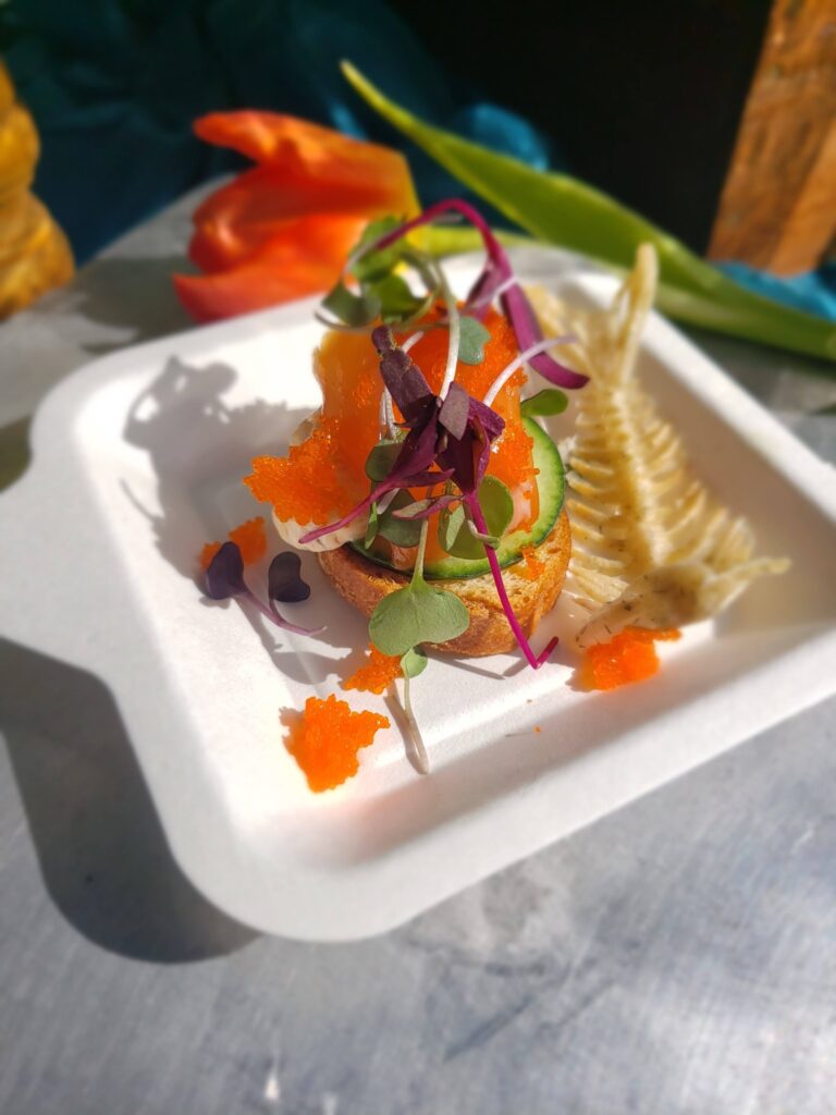 Gourmet crostini with salmon roe, cucumber, and microgreens prepared by Chef William Wells at Southern Palette Food and Drink Experience in Baton Rouge.