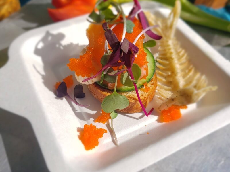 Gourmet crostini with salmon roe, cucumber, and microgreens prepared by Chef William Wells at Southern Palette Food and Drink Experience in Baton Rouge.